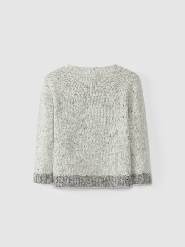 Gilet en laine tricote avec broderie