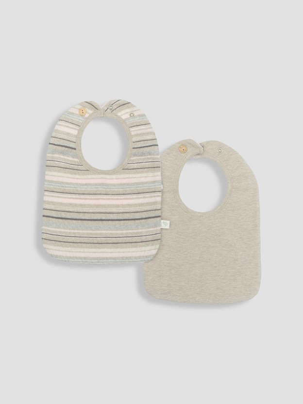 Pack two knitted bibs