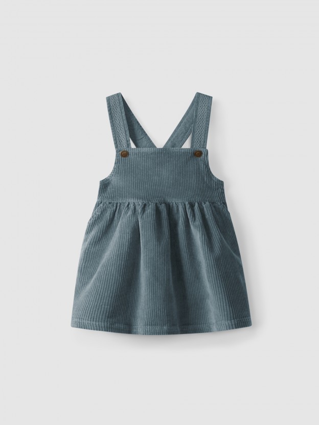 High-waisted, under-bust skirt with suspenders, with pockets