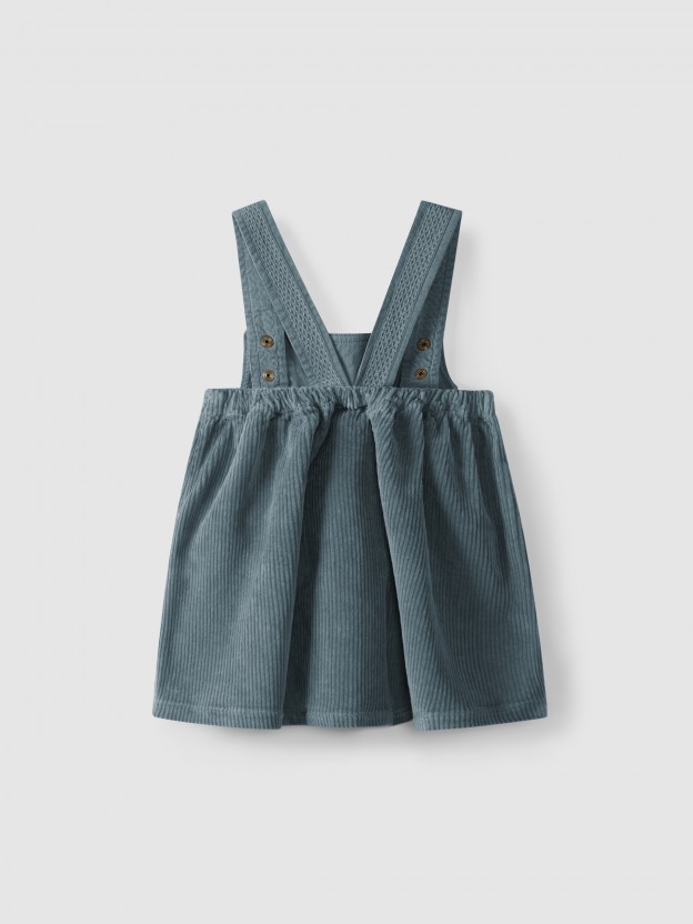 High-waisted, under-bust skirt with suspenders, with pockets