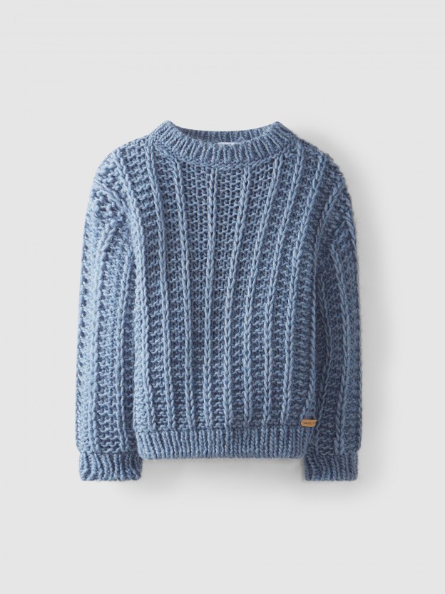 Pull tricoté à mailles larges
