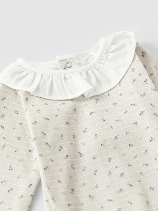 Printed babygrow with ruffled collar