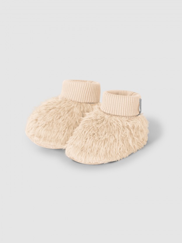 Booties in organic cotton fur