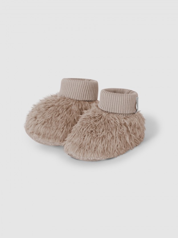 Booties in organic cotton fur