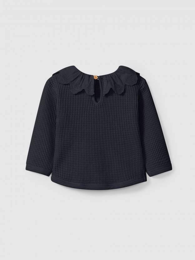 Waffle weave sweater with ruffled collar