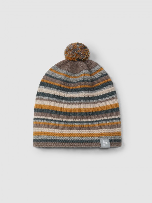 Beanie with pom-pom and embossed stripes