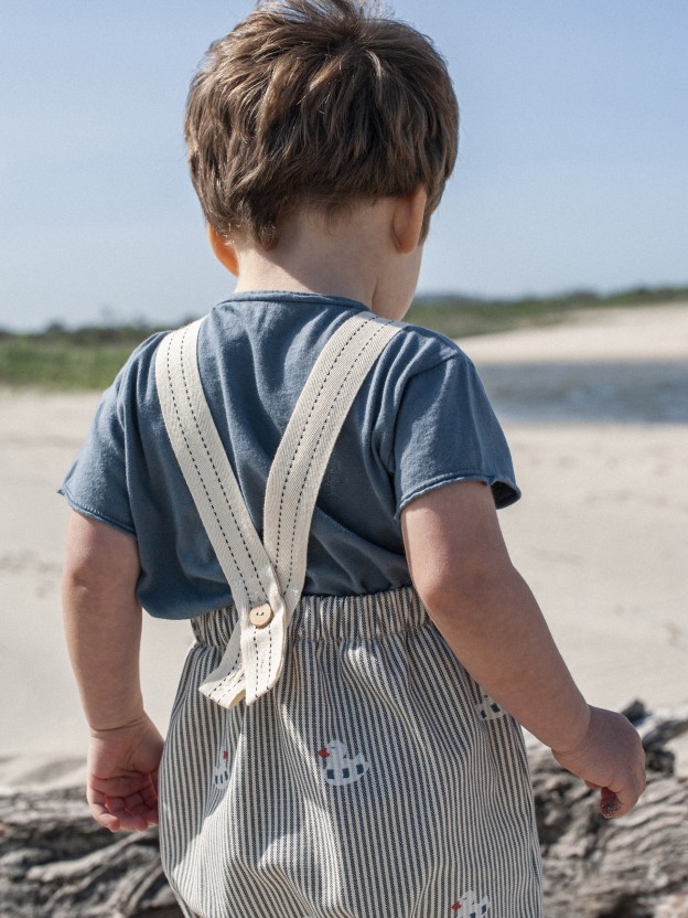 Dungarees in canvas denim with duckie