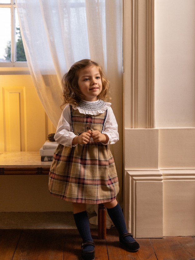 Blouse with smocking collar