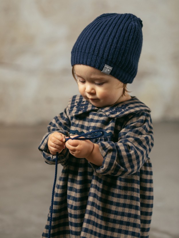 Knitted beanie with pom-pom