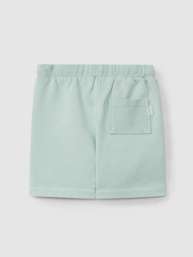 Plush shorts with waffle jersey pockets