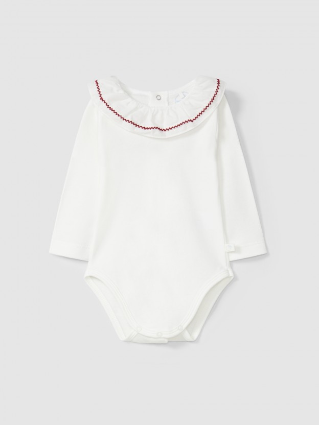 Bodysuit ruffled collar and silhouette detail