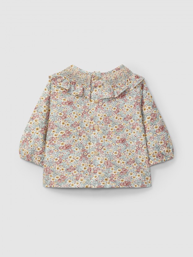 Blusa floral com smocks