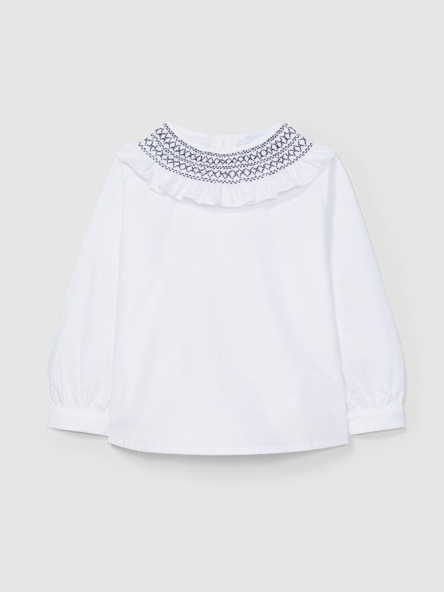 Blouse with smocking collar