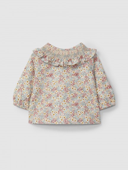 Blusa floral com smocks