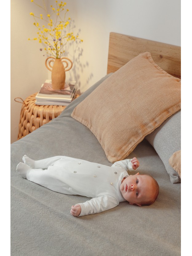 Babygrow embossed stripes with decorative buttons on the front Babygrow embossed stripes with decorative buttons on the front