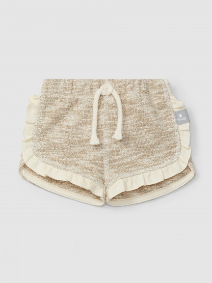 Pantaln Corto pull-up en punto efecto tejido con detalle de volante