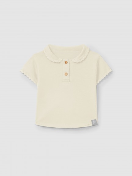 Polo uni avec dtail de galon