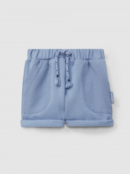Pantaln corto pull-up en felpa con bolsillos en punto gofre