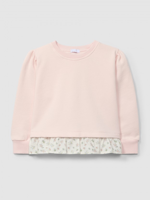 Plush sweater with ruffled detail in printed fabric