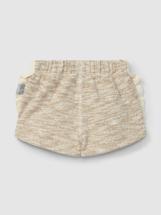 Cales pull-up em malha efeito tricot com detalhe de folho