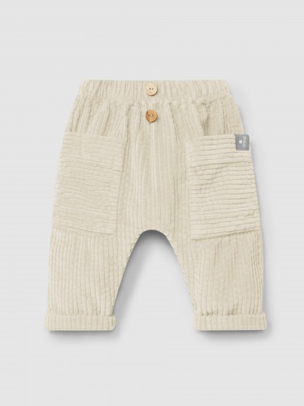 Pull-up pants in ribbed velvet with pockets