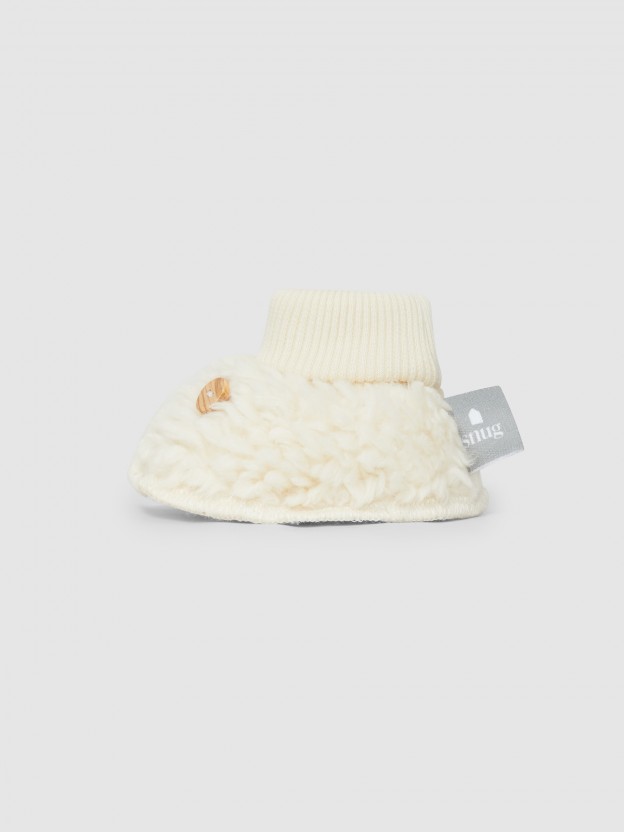 Booties in organic cotton fur