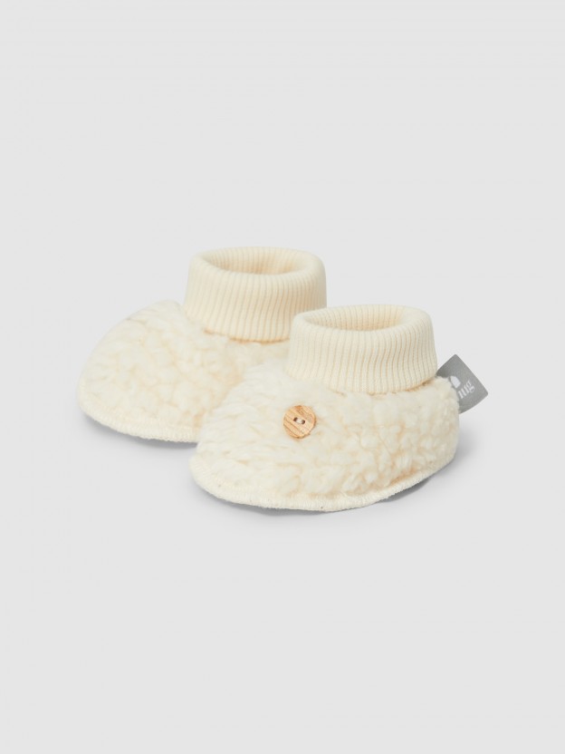 Booties in organic cotton fur