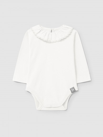 Bodysuit in organic cotton with ruffled embroidered collar