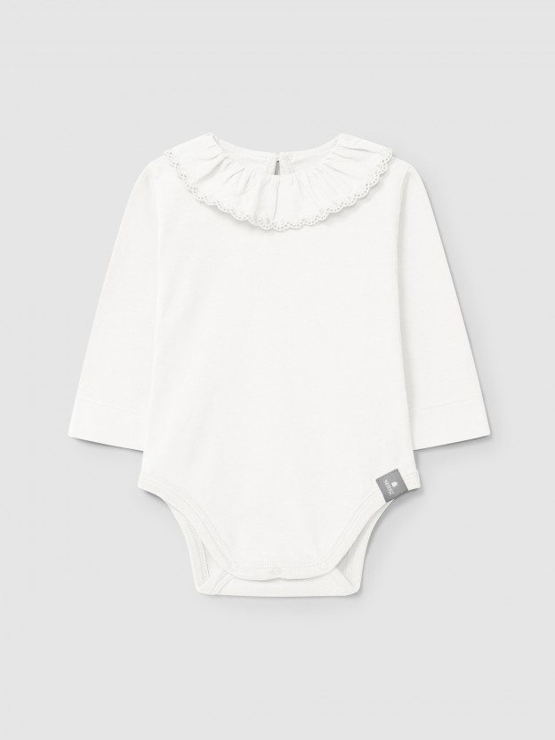 Bodysuit in organic cotton with ruffled embroidered collar