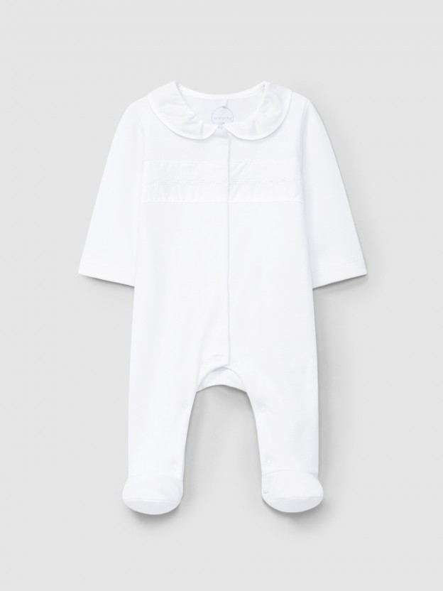 Babygrow furrow collar and embroidered flower detail on the chest Babygrow furrow collar and embroidered flower detail on the chest