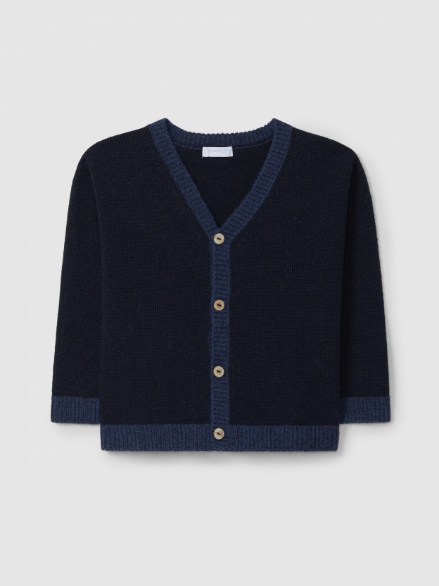 Gilet col en V tricot de couleur en contraste.