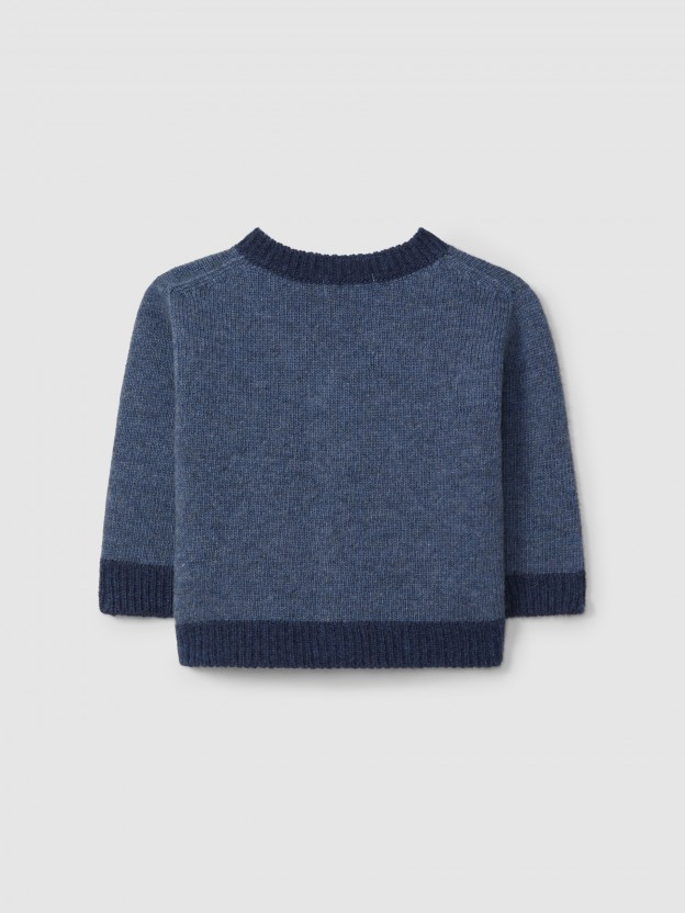Gilet col en V tricot de couleur en contraste.