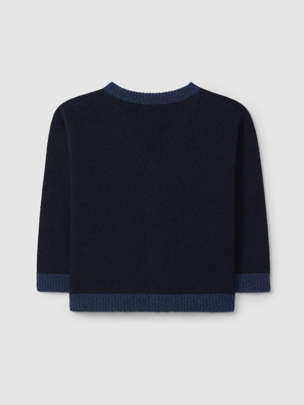 Gilet col en V tricot de couleur en contraste.