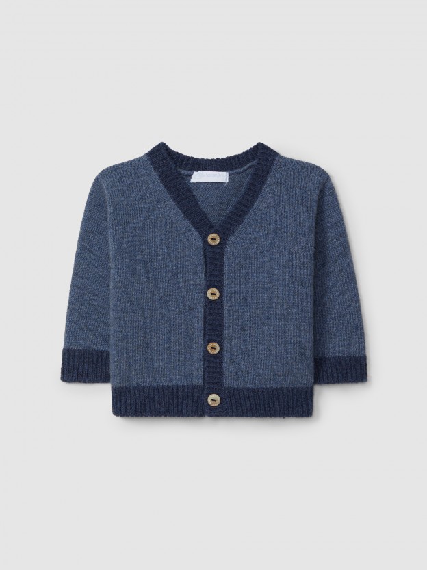 Gilet col en V tricot de couleur en contraste.