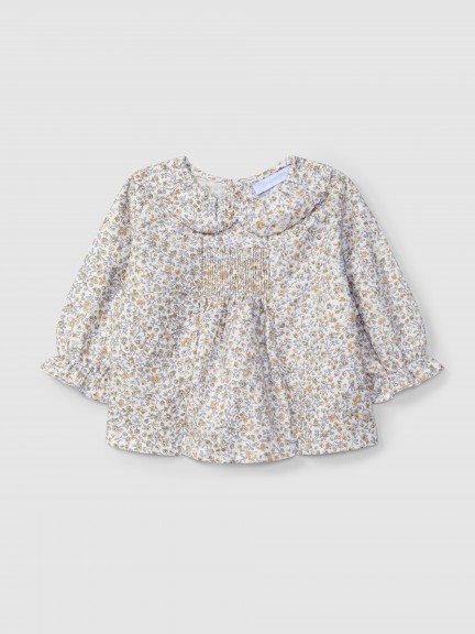Blusa floral com smocks
