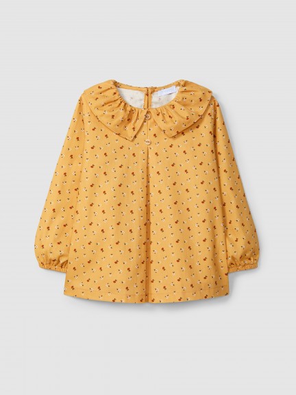 Blusa estampado floral y cuello de volante