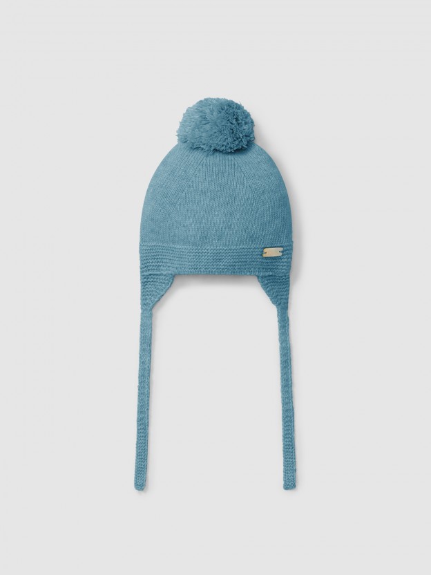 Gorro tricotado con pompn