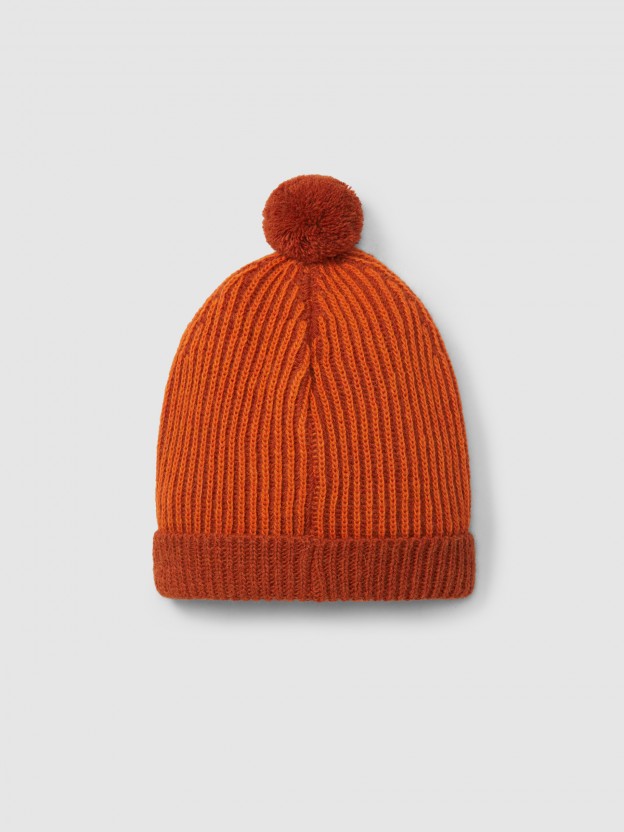 Knitted two-colour beanie with pom-pom