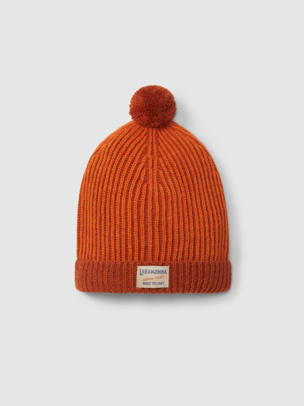 Knitted two-colour beanie with pom-pom