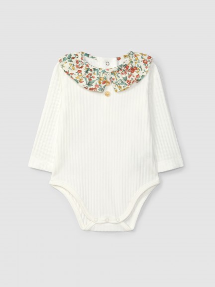 Ribbed jersey bodysuit with floral ruffled collar