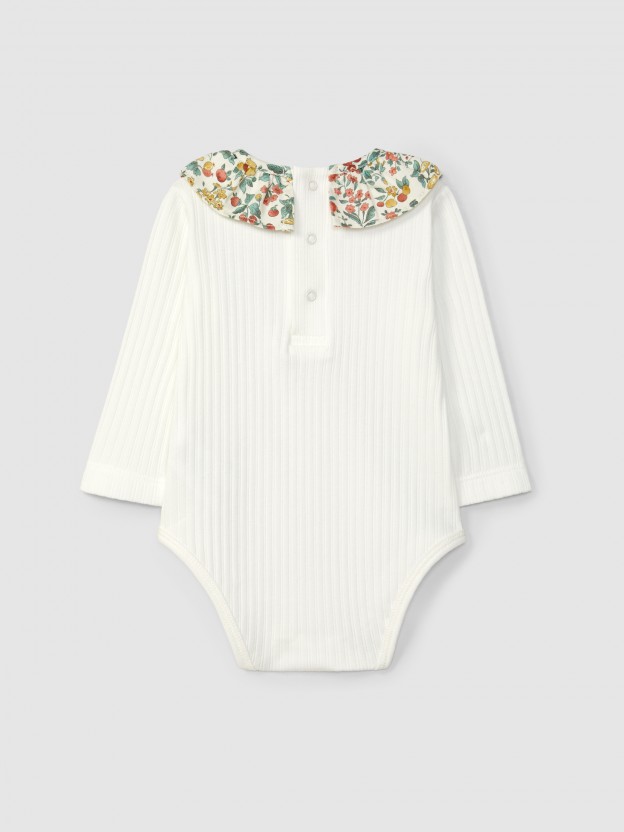 Ribbed jersey bodysuit with floral ruffled collar