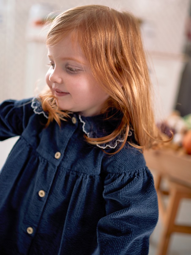 Corduroy dress with embroidered detail on the collar