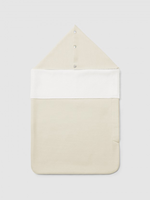 Double jersey sleeping blanket with faux fur interior